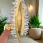Photoroom_20240708_132753 A decorative crystal and gold accent sculpture in a modern living room
